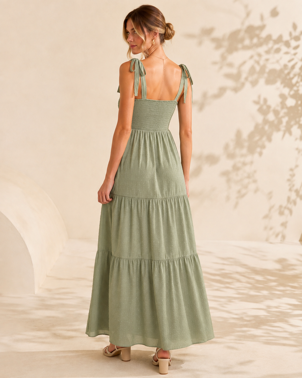 Model wearing the Meadowlight Smocked Maxi Dress in an alternate full-length pose